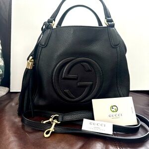 Barley used Black Leather Gucci Bag.